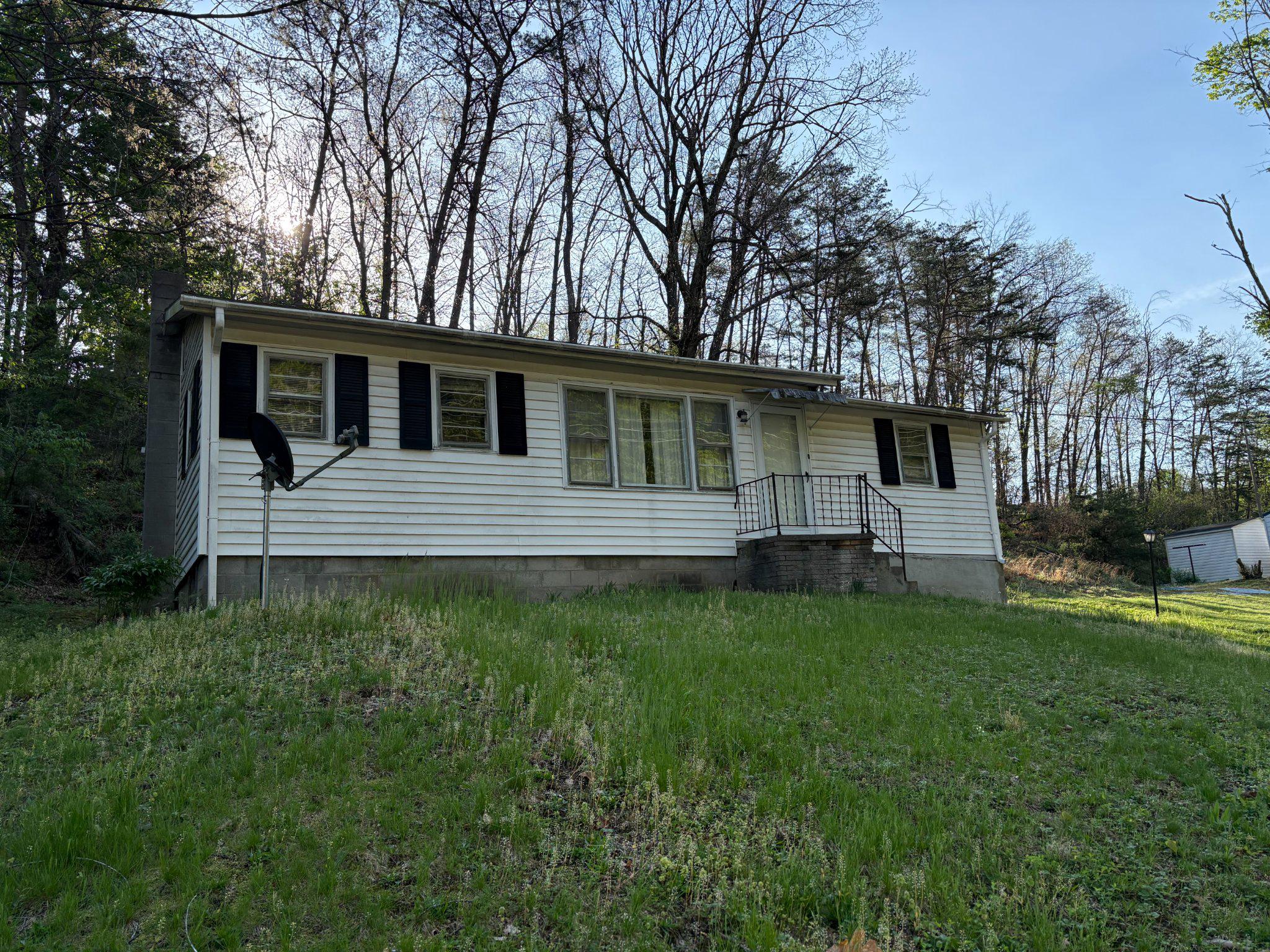 119 Radio Station Road Berkeley Springs, WV 25411 - Photo 1 of 14 Charming hillside retreat awaits you.
