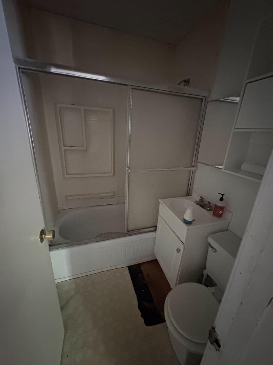 119 Radio Station Road Berkeley Springs, WV 25411 - Photo 12 of 14 Cozy bathroom with essential amenities.