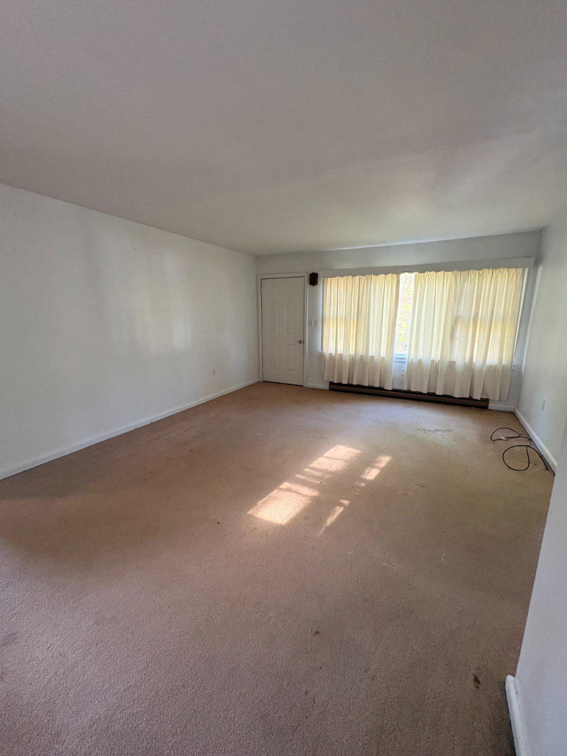 119 Radio Station Road Berkeley Springs, WV 25411 - Photo 13 of 14 Bright and airy open space awaits.