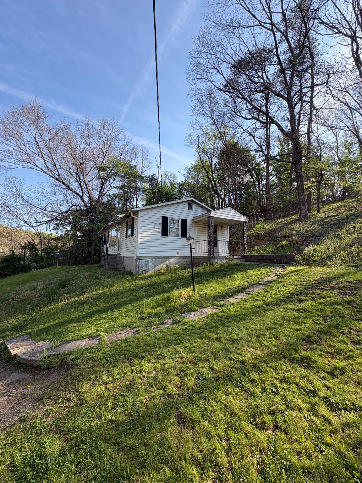 119 Radio Station Road Berkeley Springs, WV 25411 - Photo 14 of 14 Charming hillside retreat awaits you.