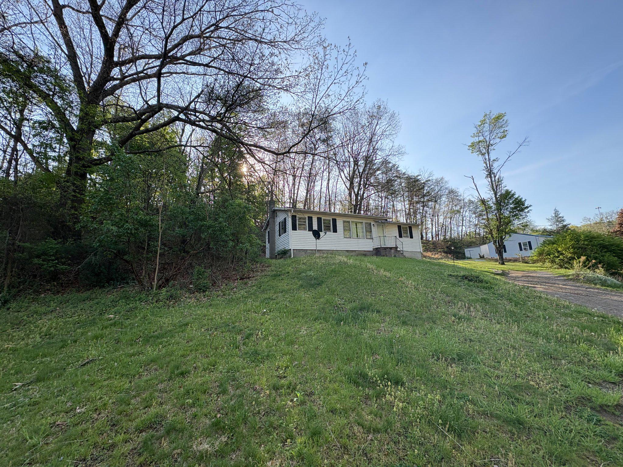 119 Radio Station Road Berkeley Springs, WV 25411 - Photo 3 of 14 Charming hillside retreat awaits you.