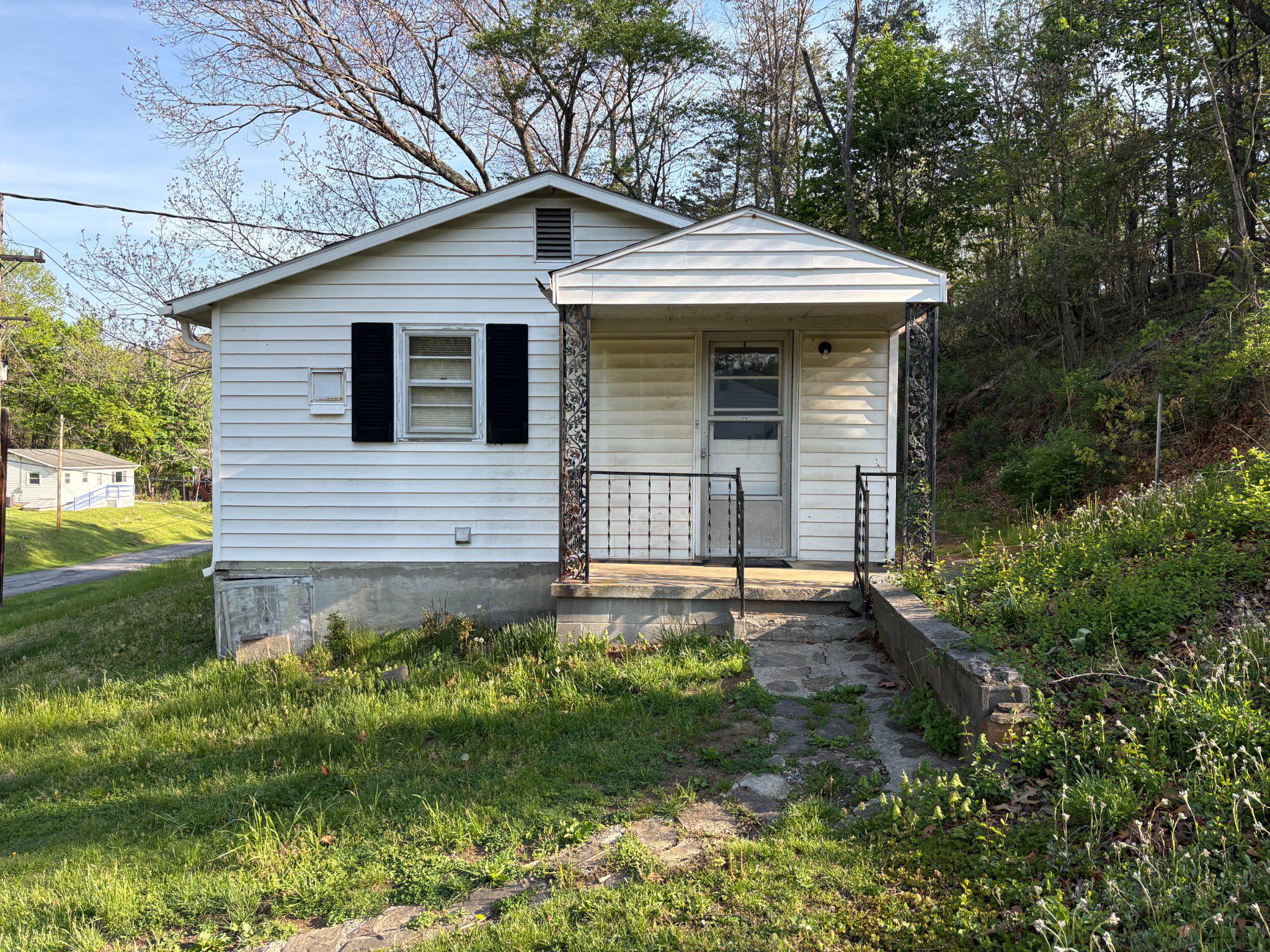 119 Radio Station Road Berkeley Springs, WV 25411 - Photo 4 of 14 Charming home with inviting porch.