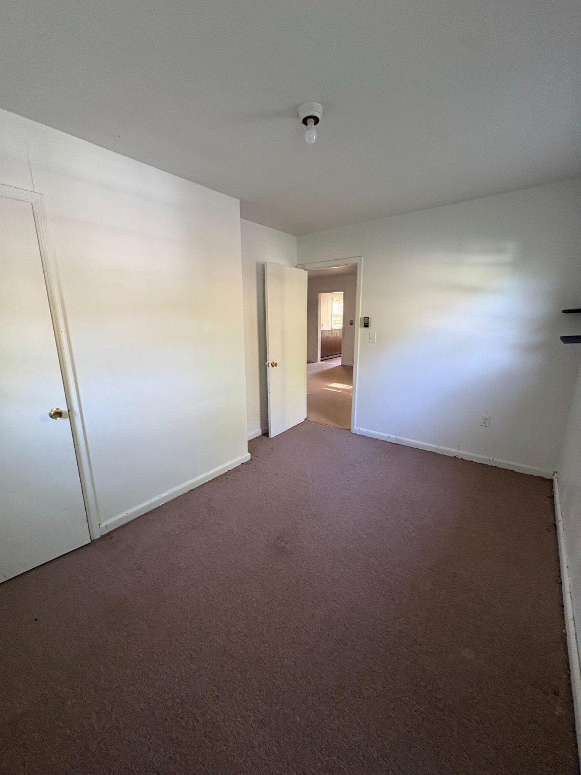119 Radio Station Road Berkeley Springs, WV 25411 - Photo 10 of 14 Spacious room with inviting light.