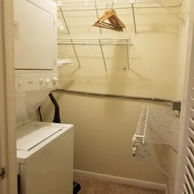 a utility room with a dryer and washer