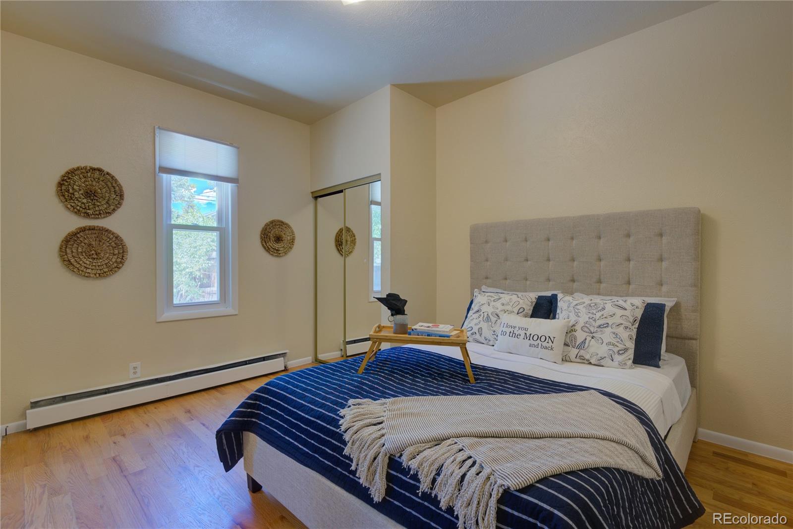 2537 Ames Street Edgewater, CO 80214 - Photo 12 of 38 a bedroom with a bed and window