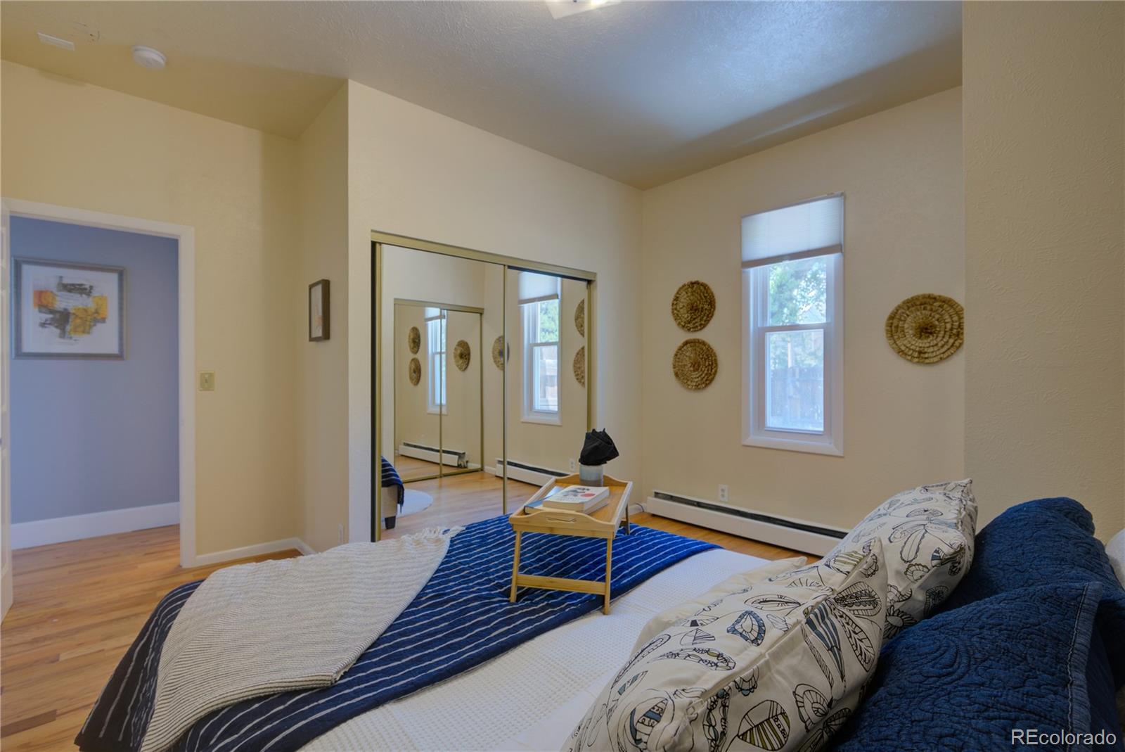 2537 Ames Street Edgewater, CO 80214 - Photo 13 of 38 a bedroom with bed and a window