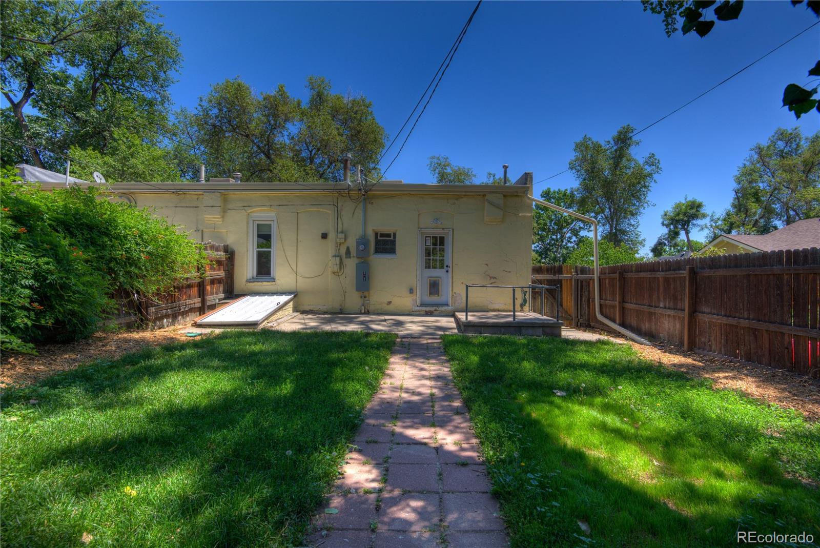 2537 Ames Street Edgewater, CO 80214 - Photo 19 of 38 a view of a back yard