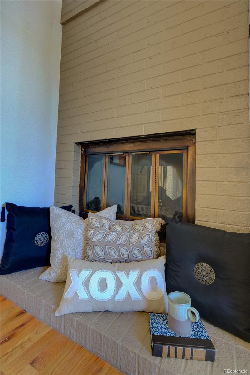 2537 Ames Street Edgewater, CO 80214 - Photo 20 of 38 a living room with furniture and rug