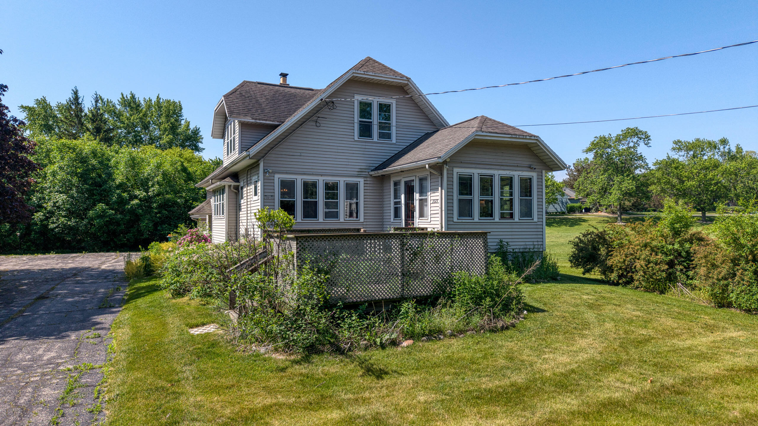 2029 West Donges Bay Road, Unit 2031 Mequon, WI 53092 - Photo 57 of 68 Front of Duplex