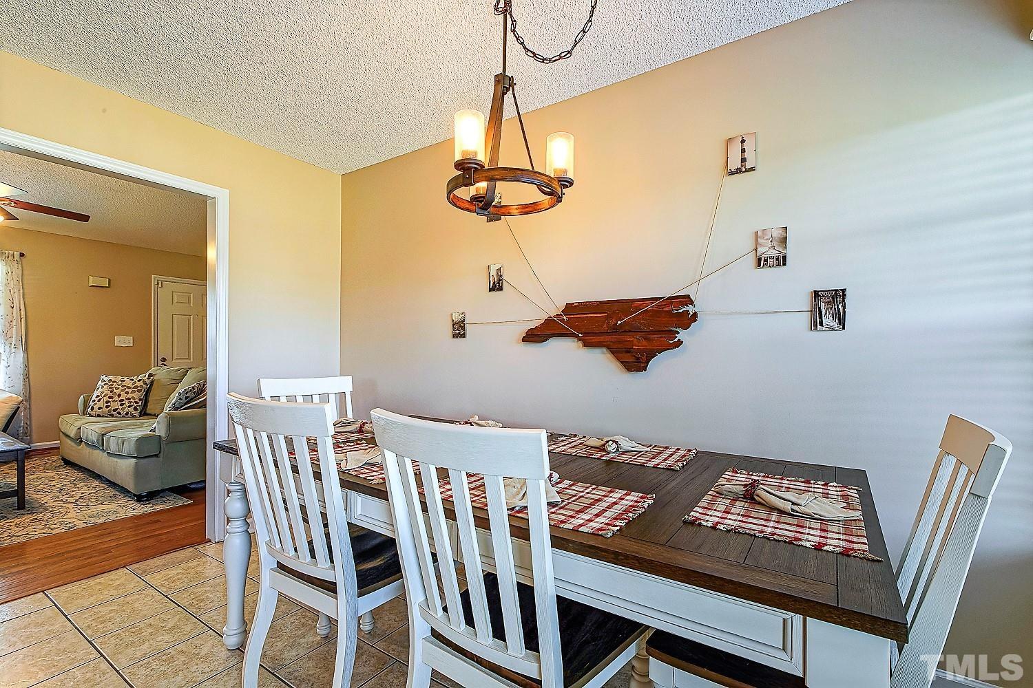 1001 Retriever Lane Raleigh, NC 27603 - Photo 19 of 50 a view of a dining room with furniture