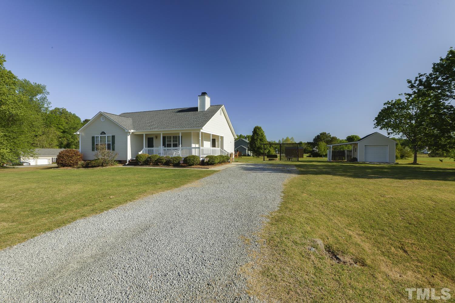 1001 Retriever Lane Raleigh, NC 27603 - Photo 2 of 50 a view of house with outdoor space and swimming pool