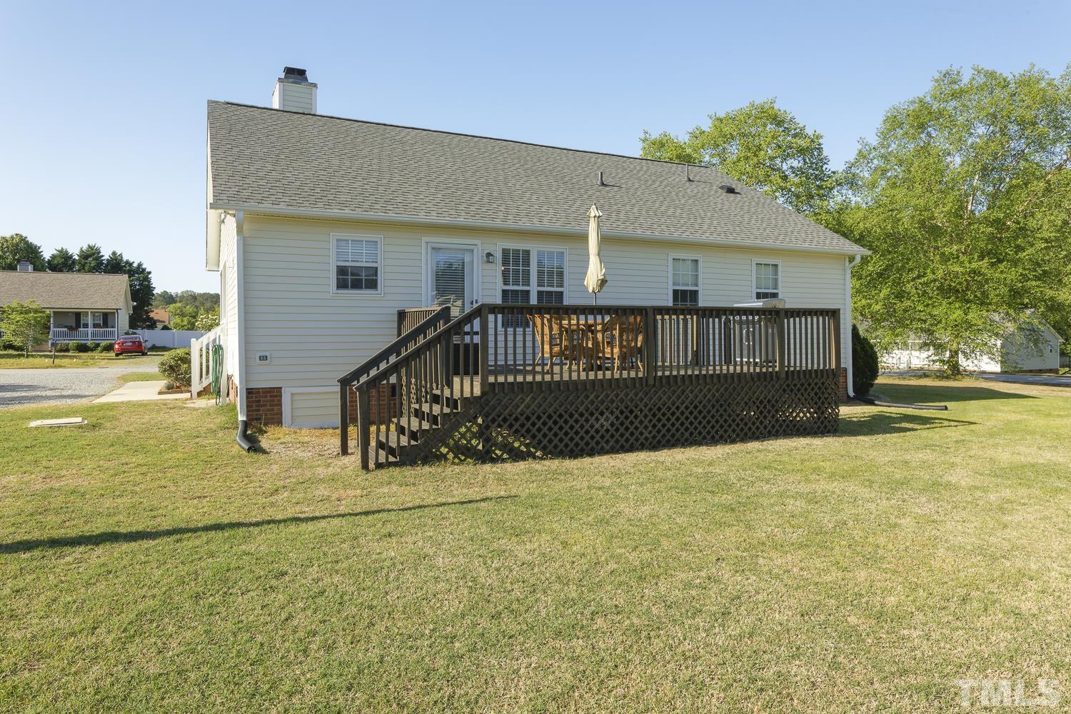 1001 Retriever Lane Raleigh, NC 27603 - Photo 47 of 50 a view of house with yard and staircase