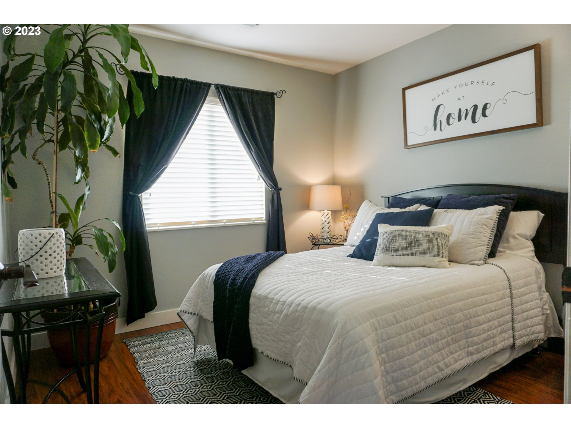 1864 Heitzman Way Eugene, OR 97402 - Photo 15 of 26 a bedroom with a bed and a window