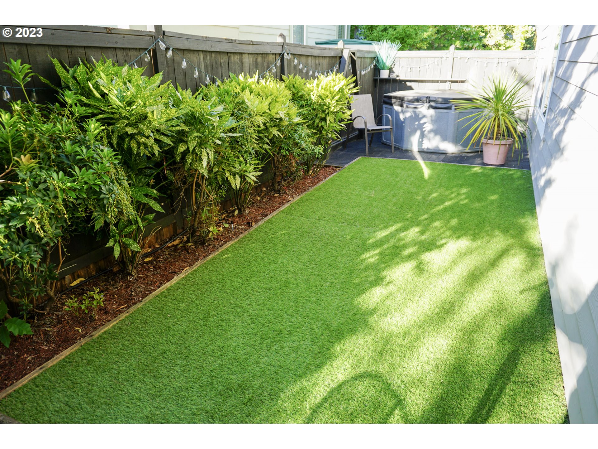 1864 Heitzman Way Eugene, OR 97402 - Photo 20 of 26 a view of a backyard with plants