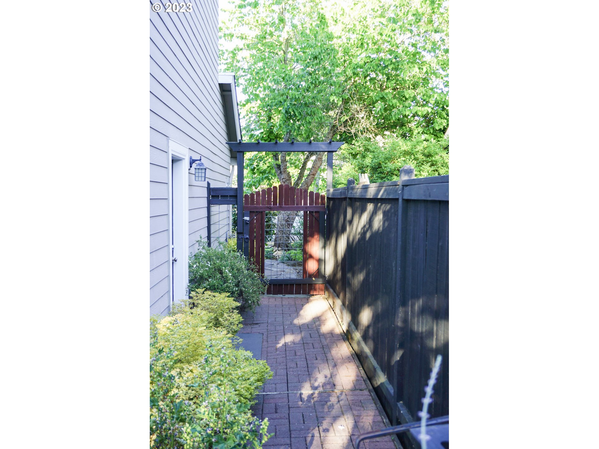 1864 Heitzman Way Eugene, OR 97402 - Photo 24 of 26 a view of a backyard with plants