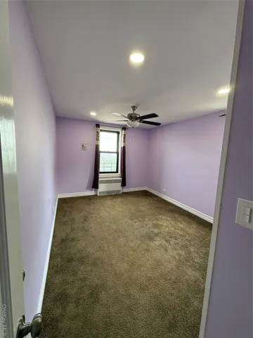 en empty room with windows