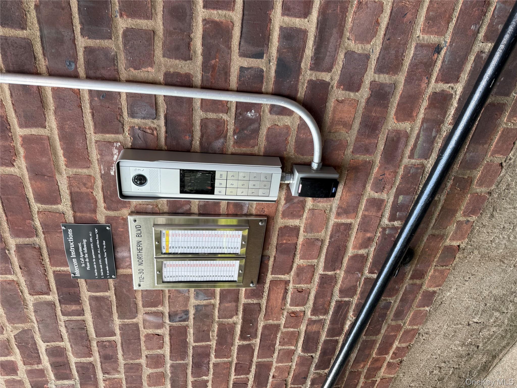 112-30 Northern Boulevard, Unit 4G Queens, NY 11368 - Photo 18 of 18 a bathroom with a granite countertop sink and a mirror