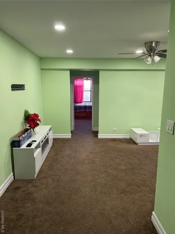 a room with furniture and a window