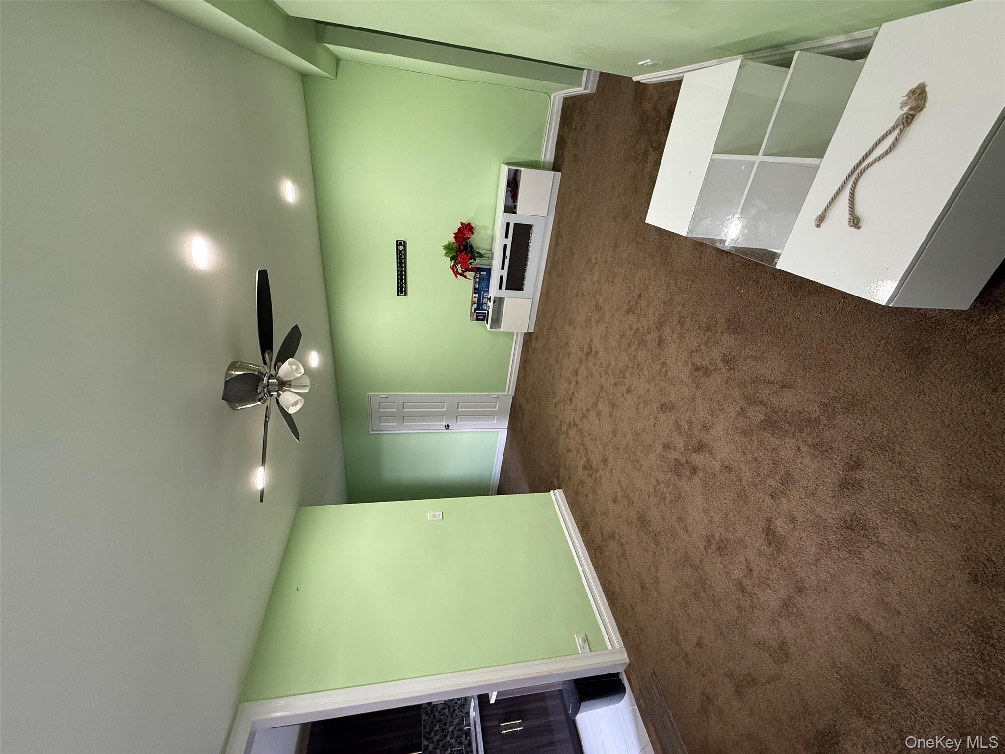 112-30 Northern Boulevard, Unit 4G Queens, NY 11368 - Photo 7 of 18 a view of a livingroom with furniture