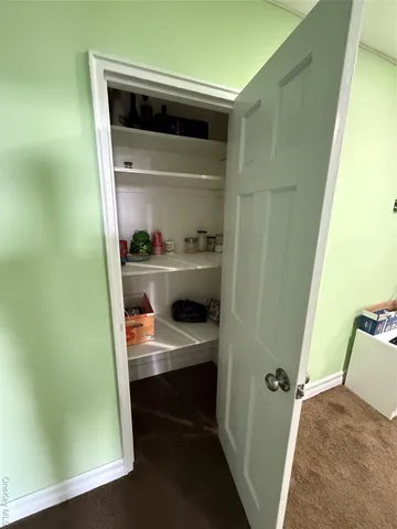 a room with walk in closet