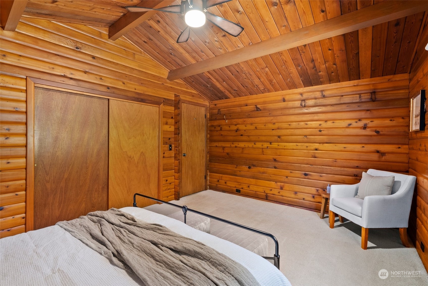 1028 King Road Winlock, WA 98596 - Photo 17 of 38 a bedroom with a bed and a chair