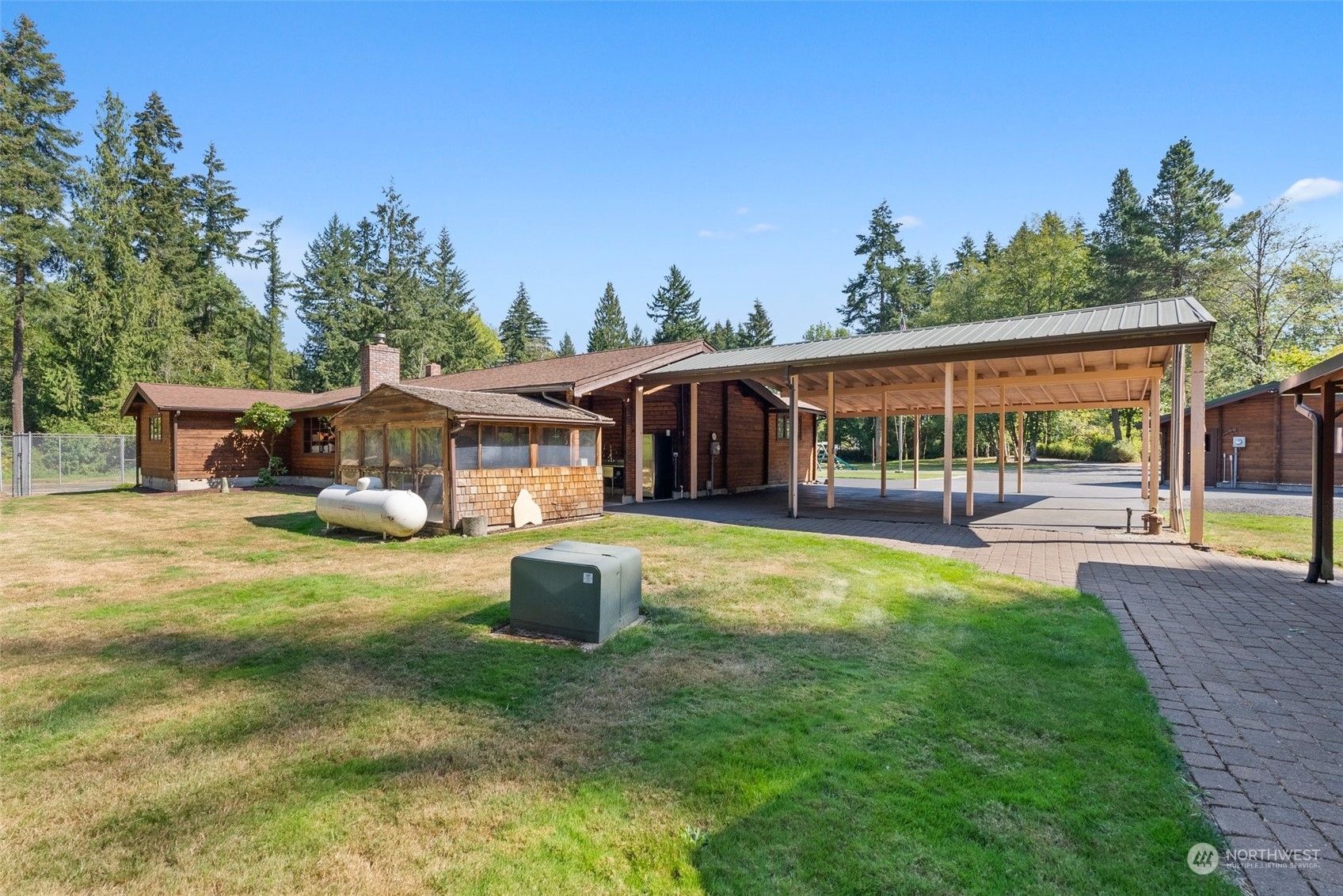 1028 King Road Winlock, WA 98596 - Photo 25 of 38 a front view of a house with a yard table and chairs