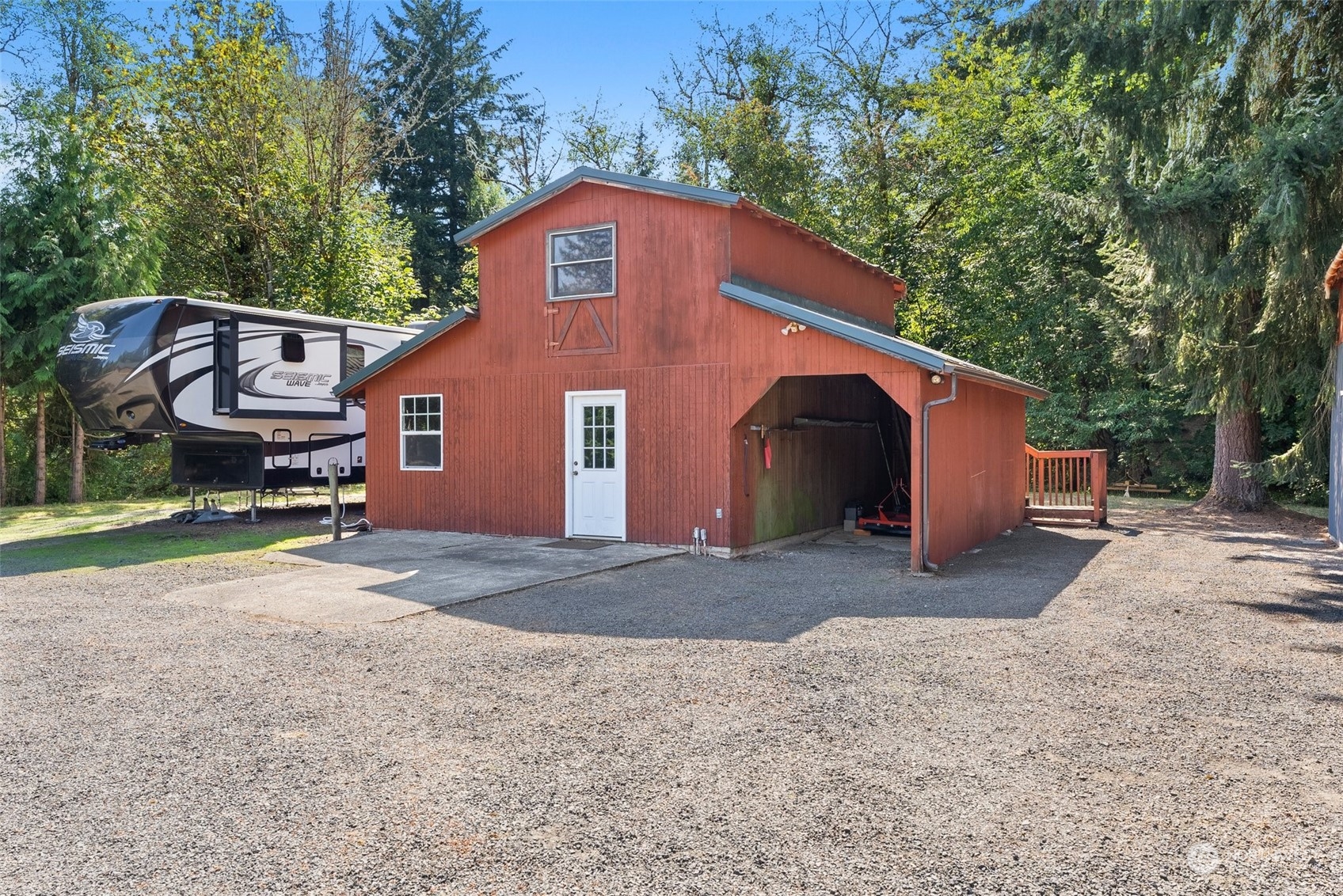 1028 King Road Winlock, WA 98596 - Photo 28 of 38 a view of a house with backyard and trees