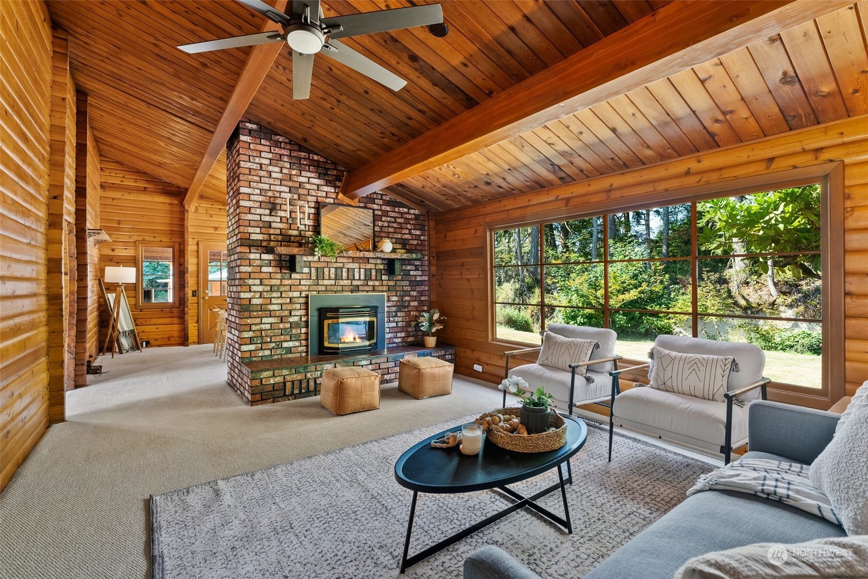 1028 King Road Winlock, WA 98596 - Photo 3 of 38 a outdoor living space with patio furniture and a fireplace