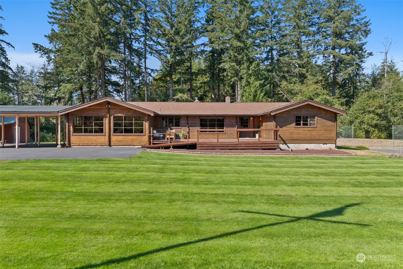 1028 King Road Winlock, WA 98596 - Photo 35 of 38 a front view of a house with a yard table and chairs