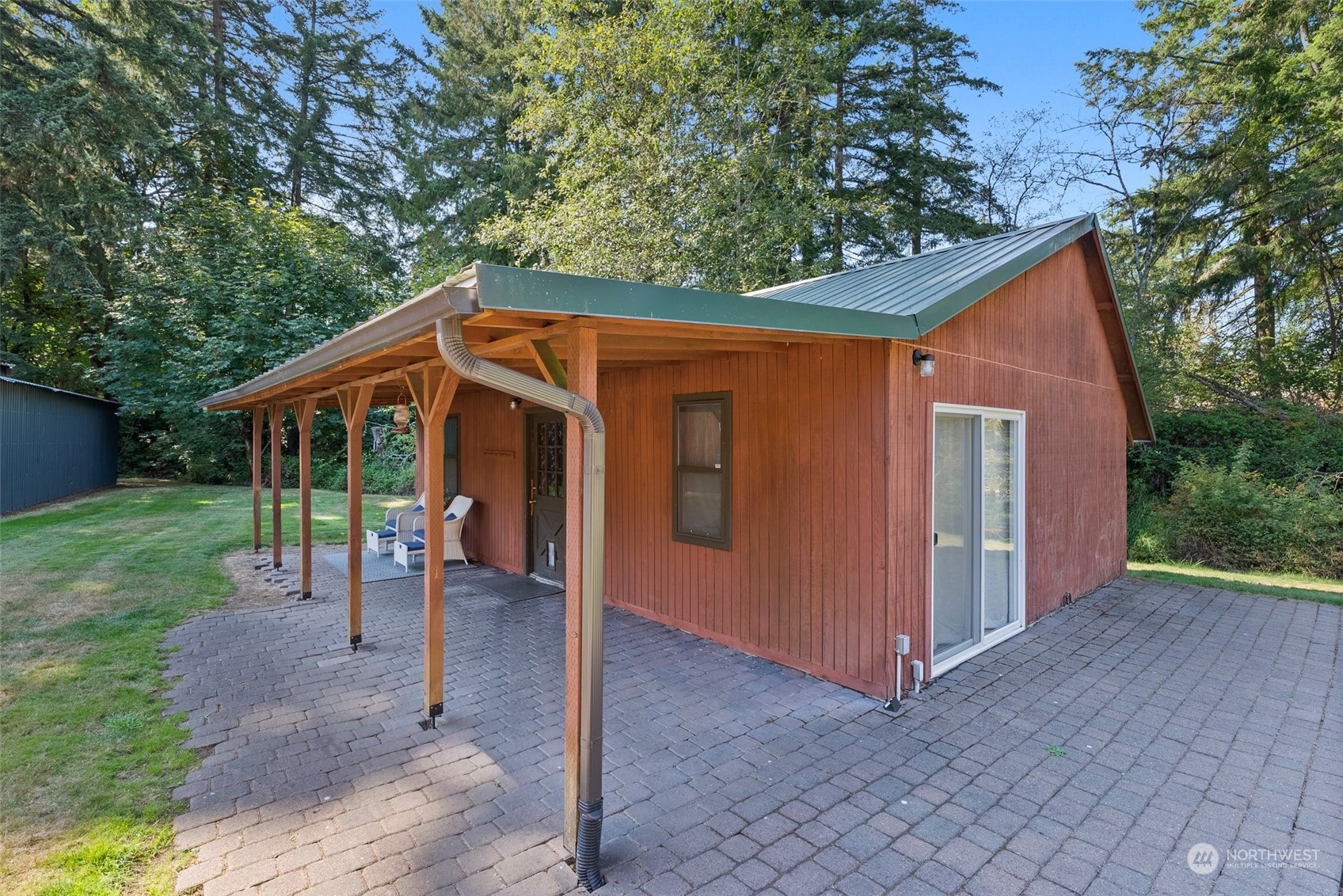 1028 King Road Winlock, WA 98596 - Photo 5 of 38 a backyard of a house with table and chairs