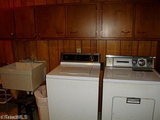 1840 Tussey Road Lexington, NC 27295 - Photo 8 of 16 Laundry Room. Laundry Area/Mudroom area located just off kitchen, Direct door from exterior leads in, Utility sink, shelving, AND a 3rd shower!