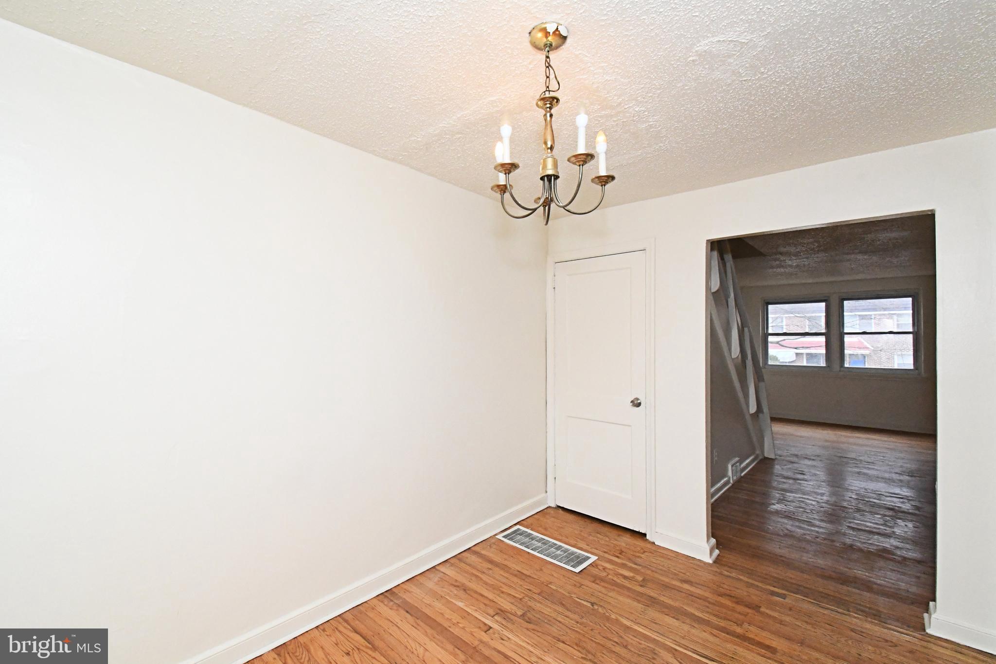 1107 East Sharpnack Street Philadelphia, PA 19150 - Photo 14 of 41 a view of a livingroom with a chandelier