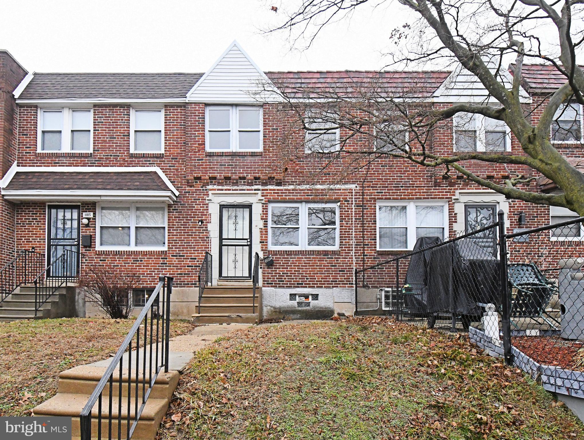 1107 East Sharpnack Street Philadelphia, PA 19150 - Photo 2 of 41 a front view of a house with outdoor seating