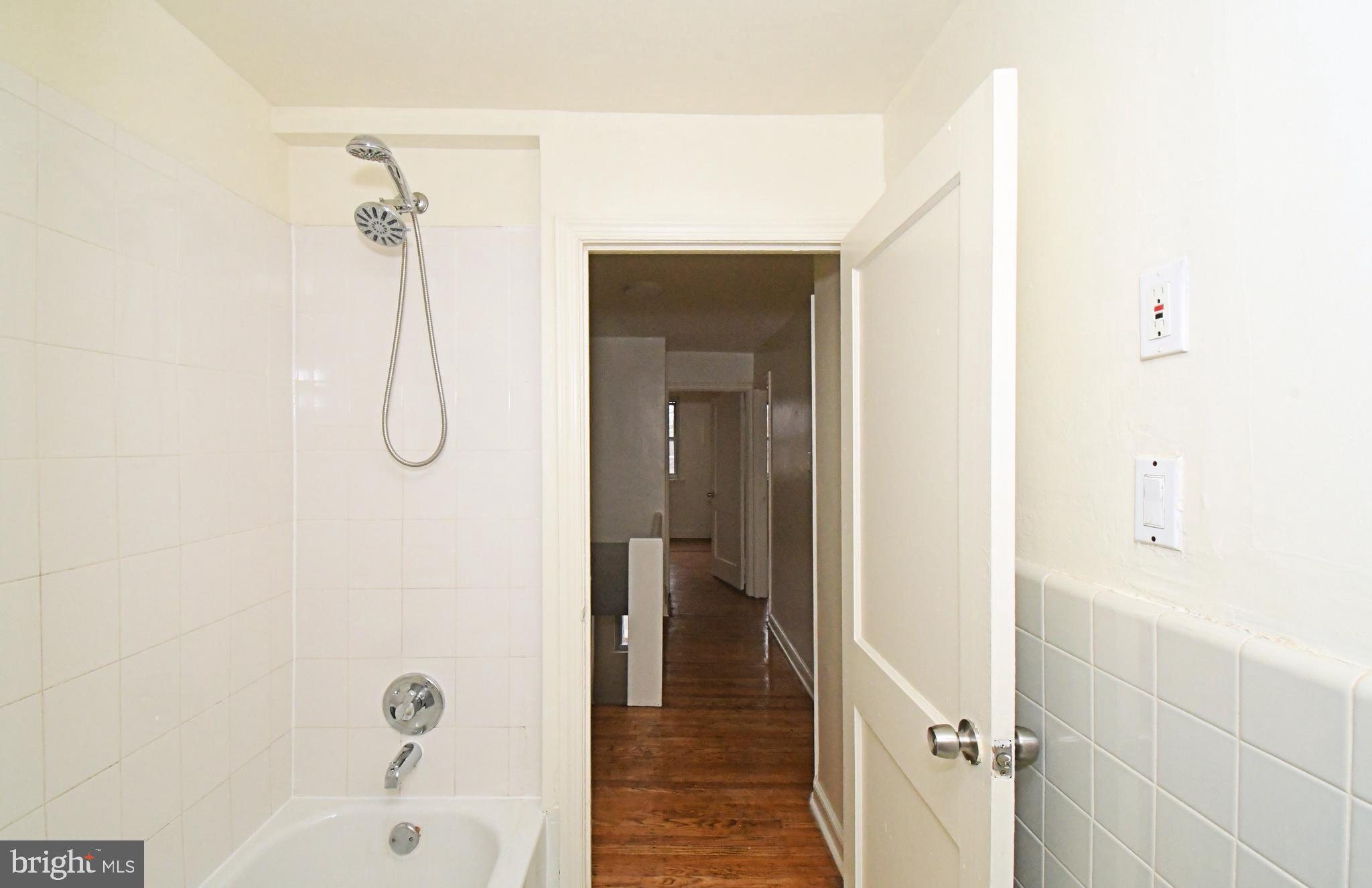 1107 East Sharpnack Street Philadelphia, PA 19150 - Photo 25 of 41 a bathroom with a shower