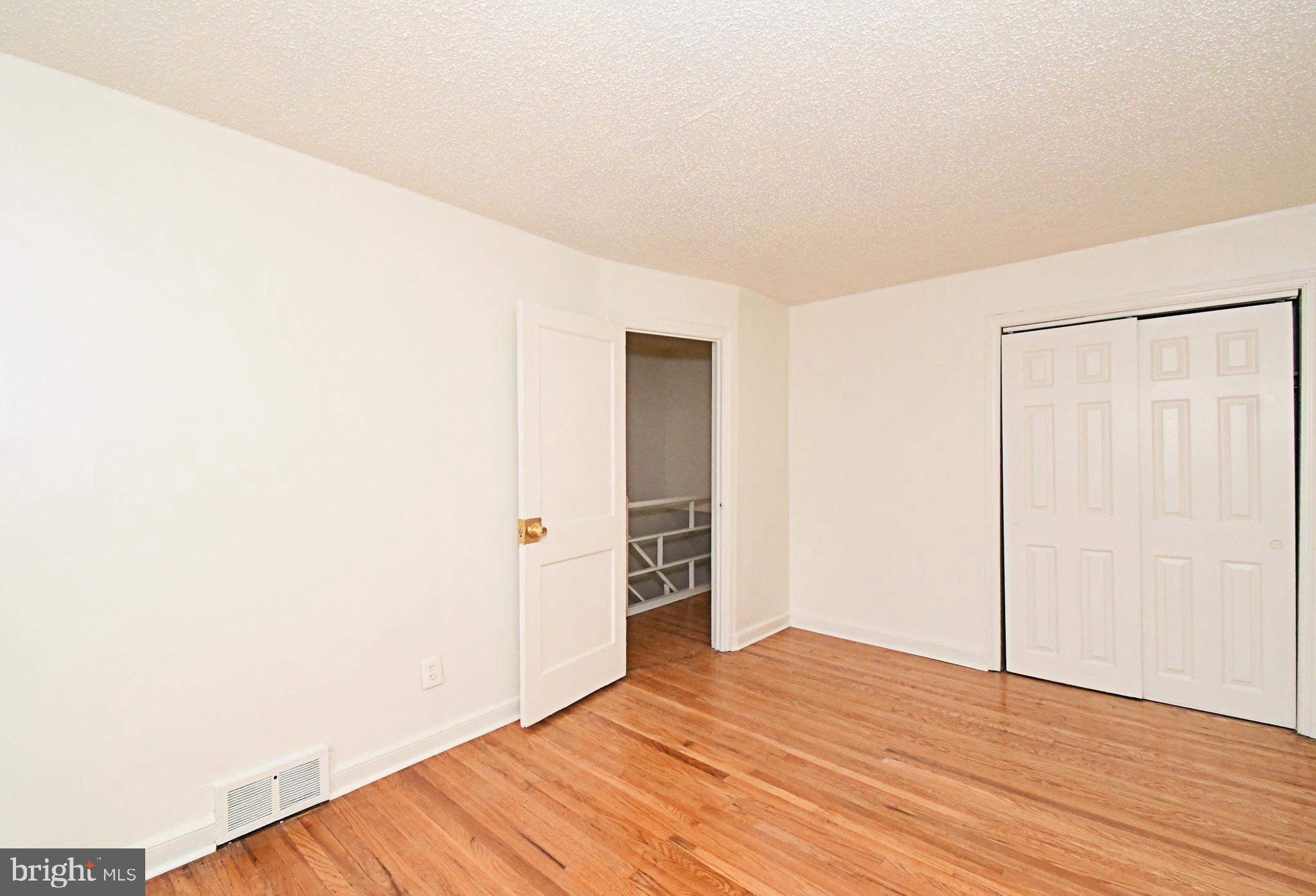 1107 East Sharpnack Street Philadelphia, PA 19150 - Photo 29 of 41 a view of empty room with wooden floor