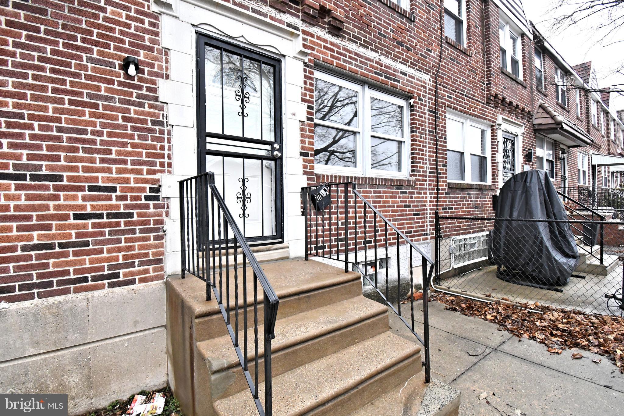 1107 East Sharpnack Street Philadelphia, PA 19150 - Photo 3 of 41 a view of a balcony with chairs