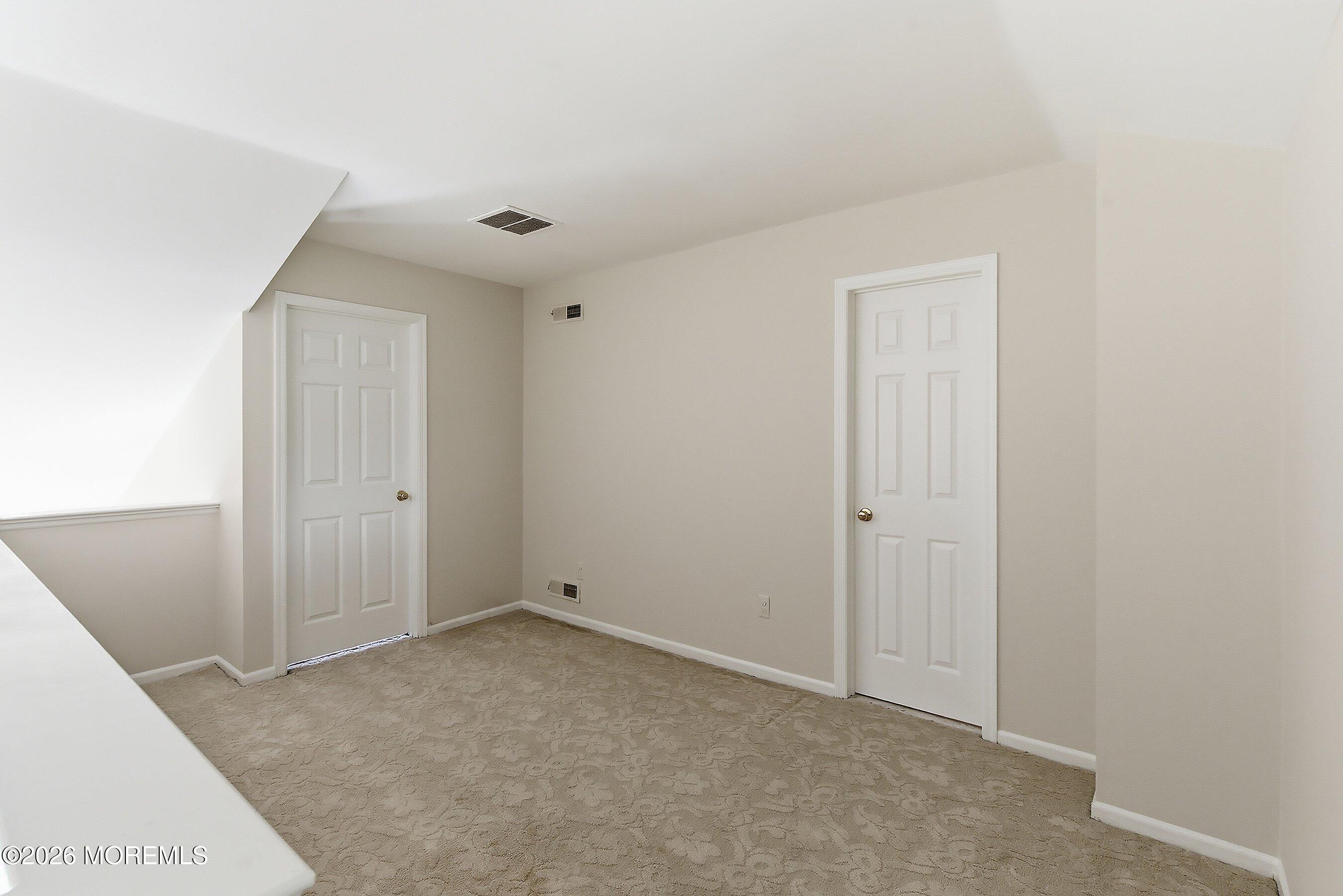 34 B Rutland Lane Monroe Township, NJ 08831 - Photo 21 of 46 a view of an empty room