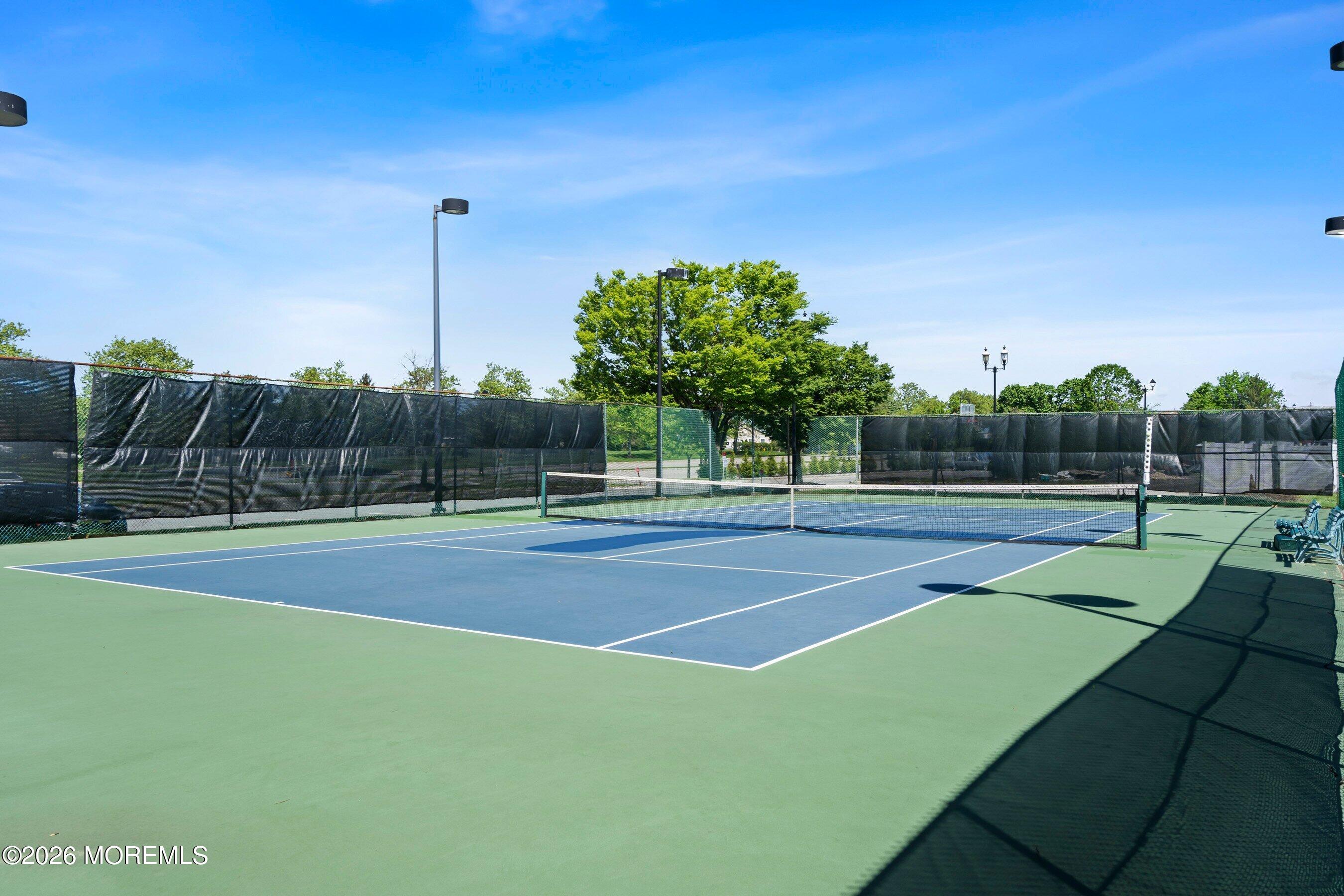 34 B Rutland Lane Monroe Township, NJ 08831 - Photo 43 of 46 a view of a tennis court