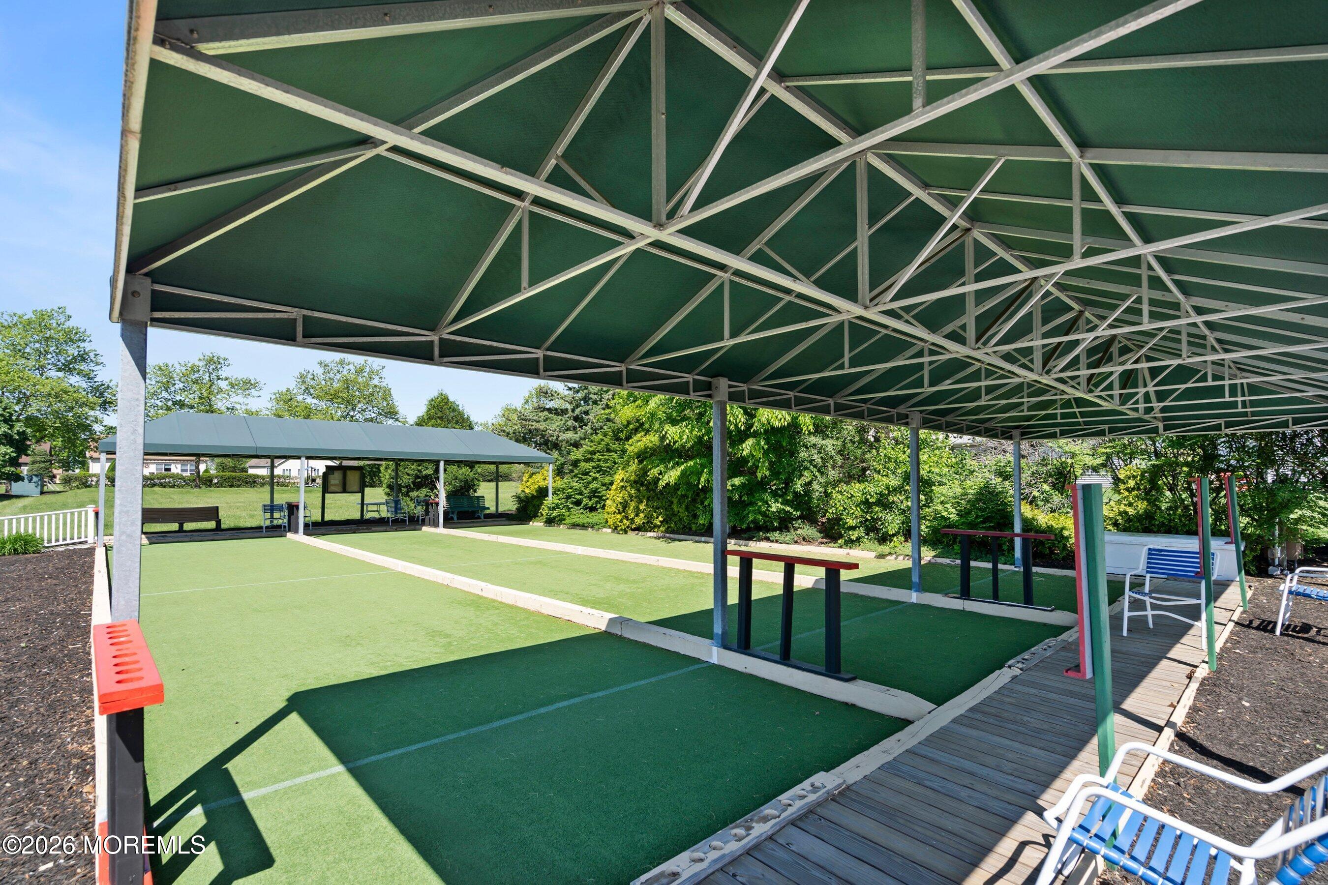 34 B Rutland Lane Monroe Township, NJ 08831 - Photo 45 of 46 a view of a backyard with sitting area