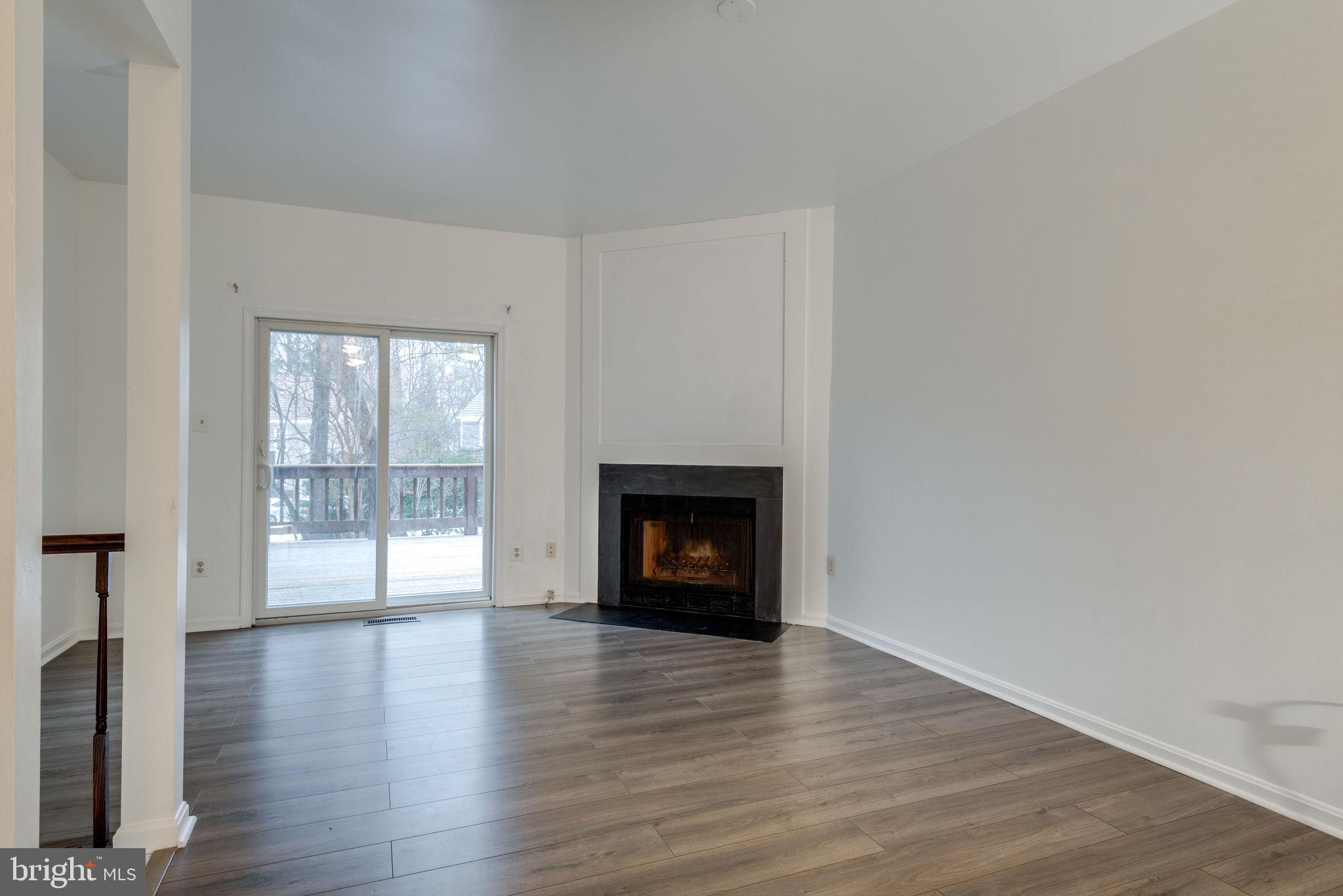 11219 Silentwood Lane Reston, VA 20191 - Photo 14 of 44 New wood look flooring throughout