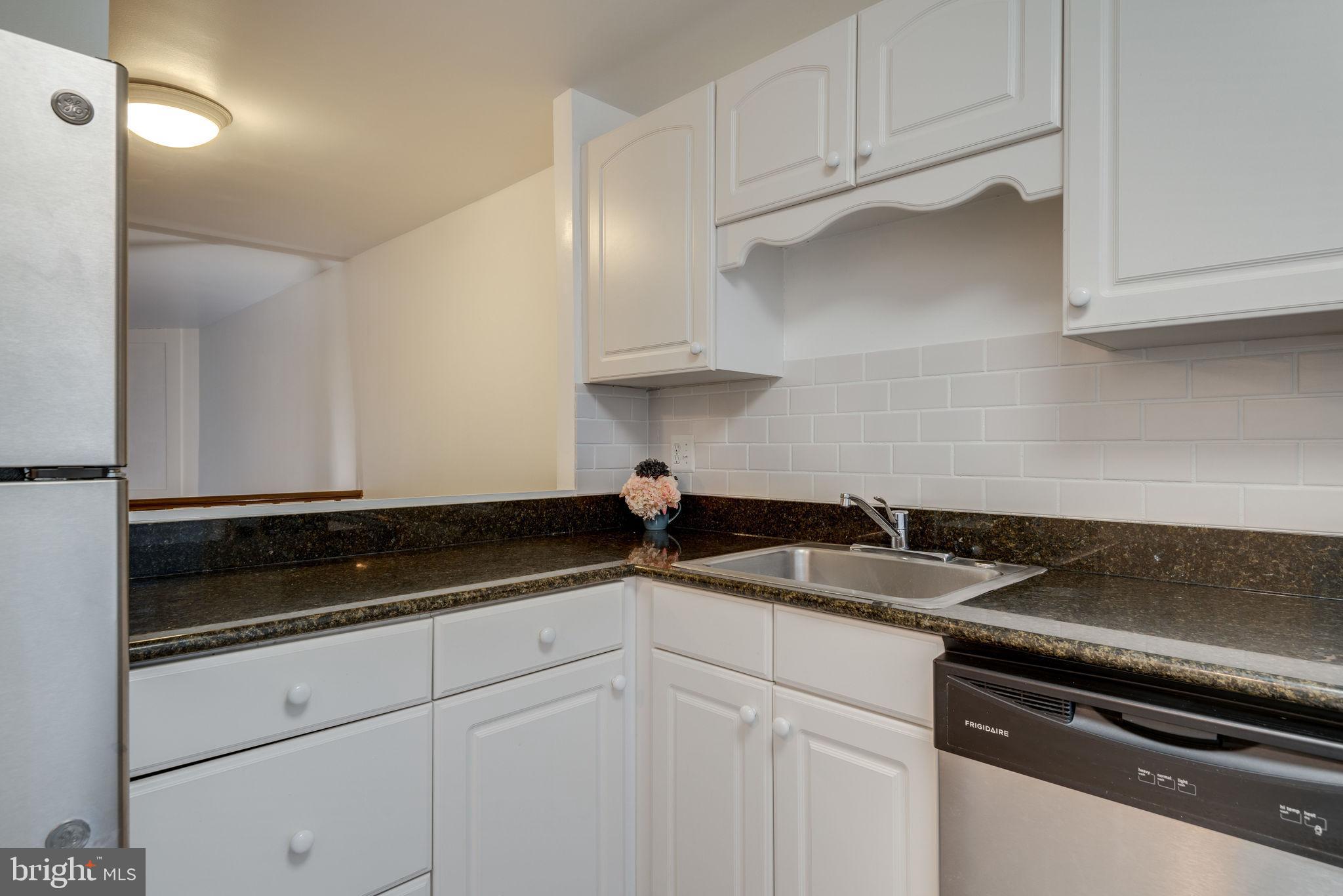 11219 Silentwood Lane Reston, VA 20191 - Photo 6 of 44 View to dining and living room