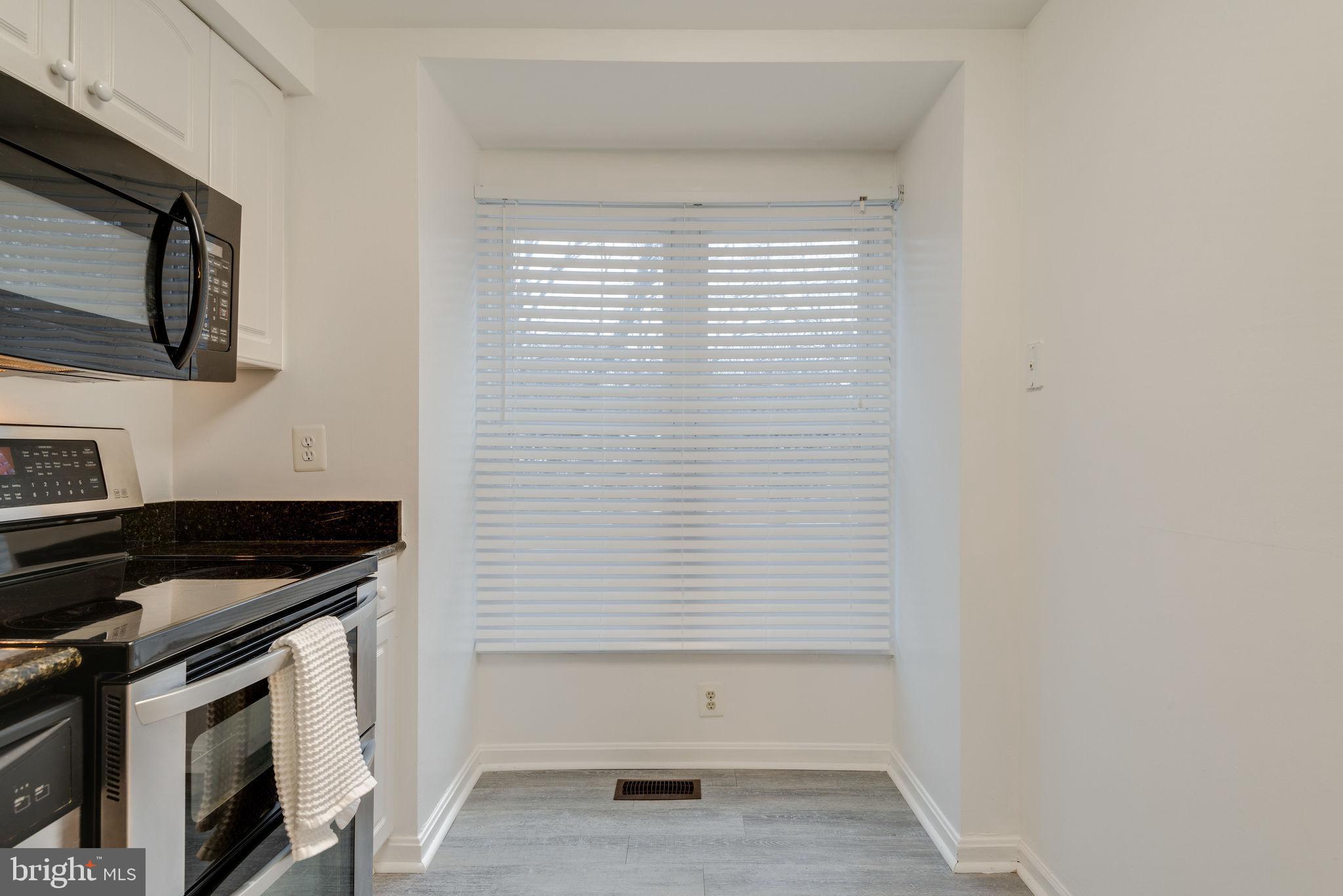 11219 Silentwood Lane Reston, VA 20191 - Photo 8 of 44 Large window with lots of light