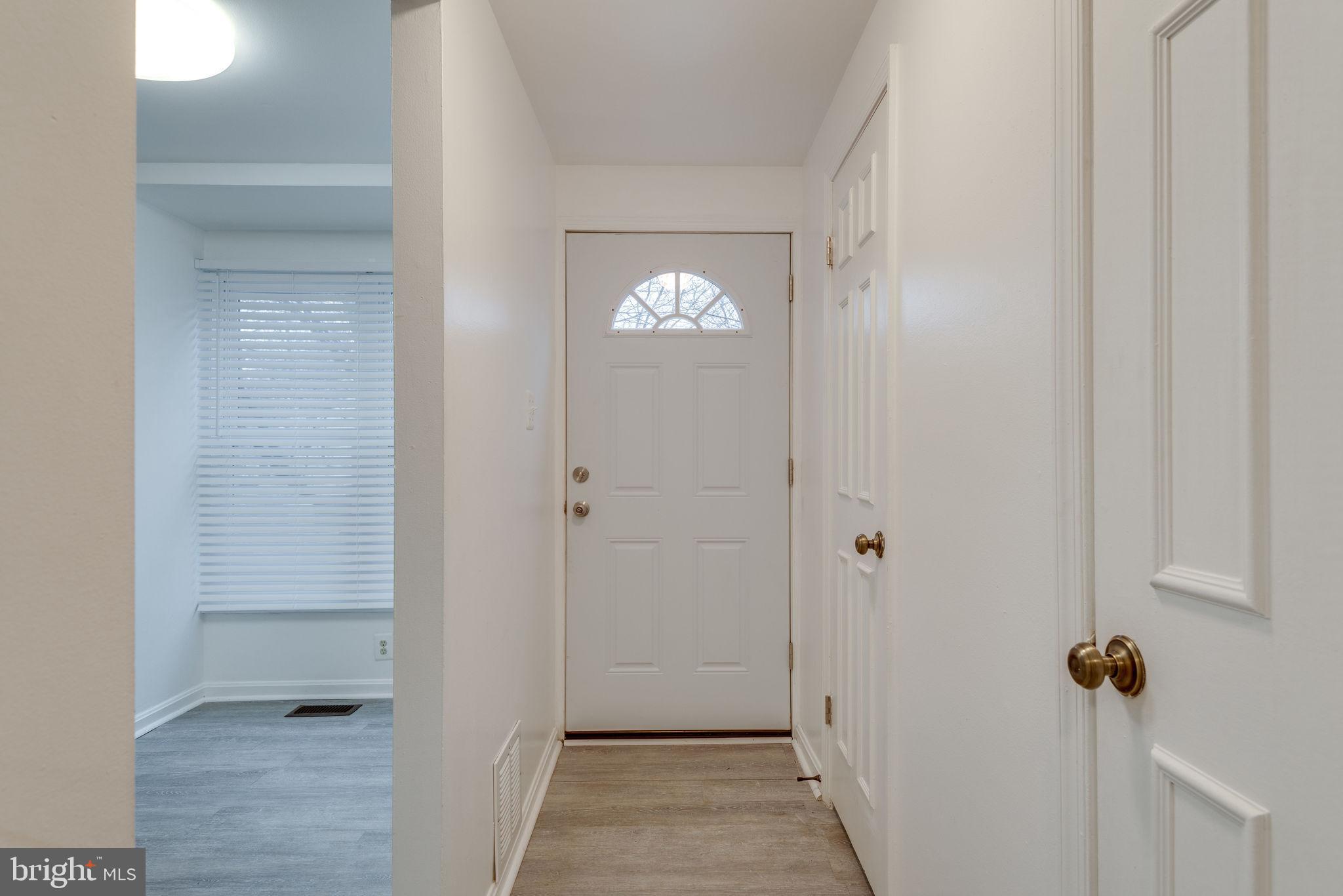11219 Silentwood Lane Reston, VA 20191 - Photo 9 of 44 Looking toward the front door from inside