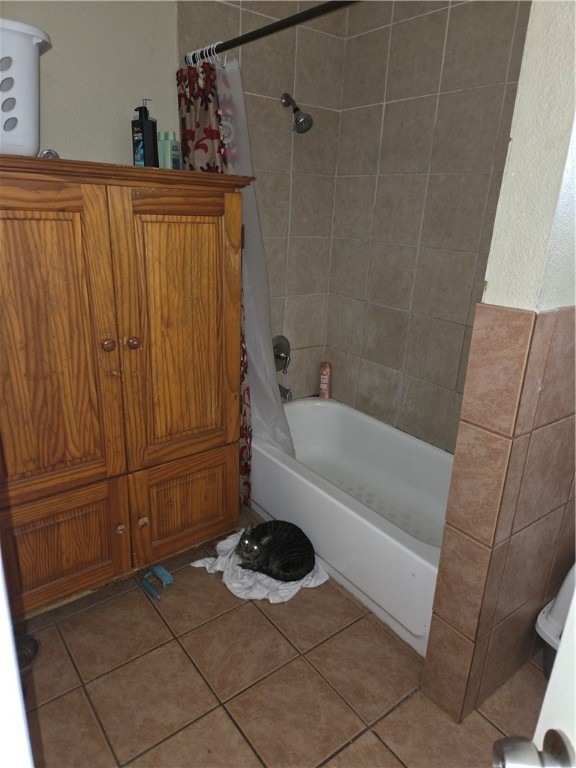 4845 Monitor Street Corpus Christi, TX 78415 - Photo 11 of 16 a bathroom with a bathtub and a shower