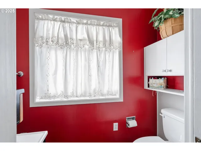 a view of a red door and chair