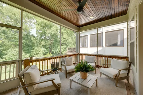 a view of a porch with furniture
