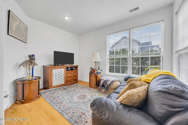 $869,000 | 155 Point Of Woods Boulevard, Morganville, NJ 07751