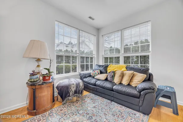 $869,000 | 155 Point Of Woods Boulevard, Morganville, NJ 07751