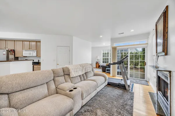 $869,000 | 155 Point Of Woods Boulevard, Morganville, NJ 07751