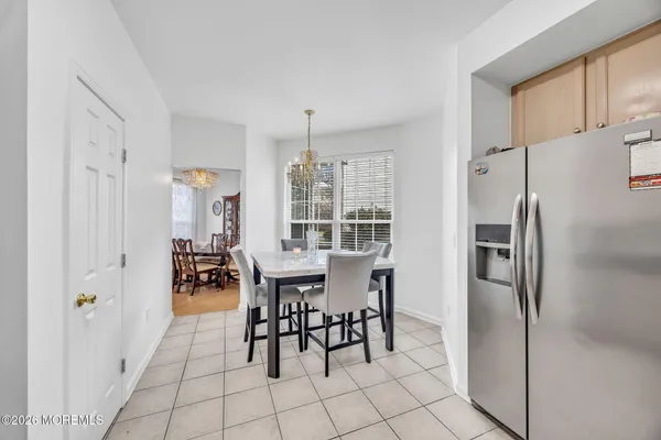 $869,000 | 155 Point Of Woods Boulevard, Morganville, NJ 07751